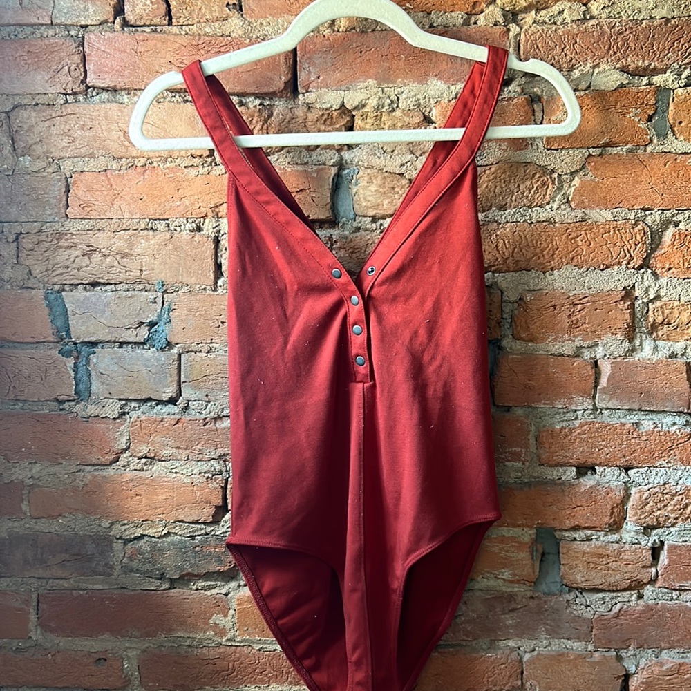 Burnt red body suit from Urban Outfitters